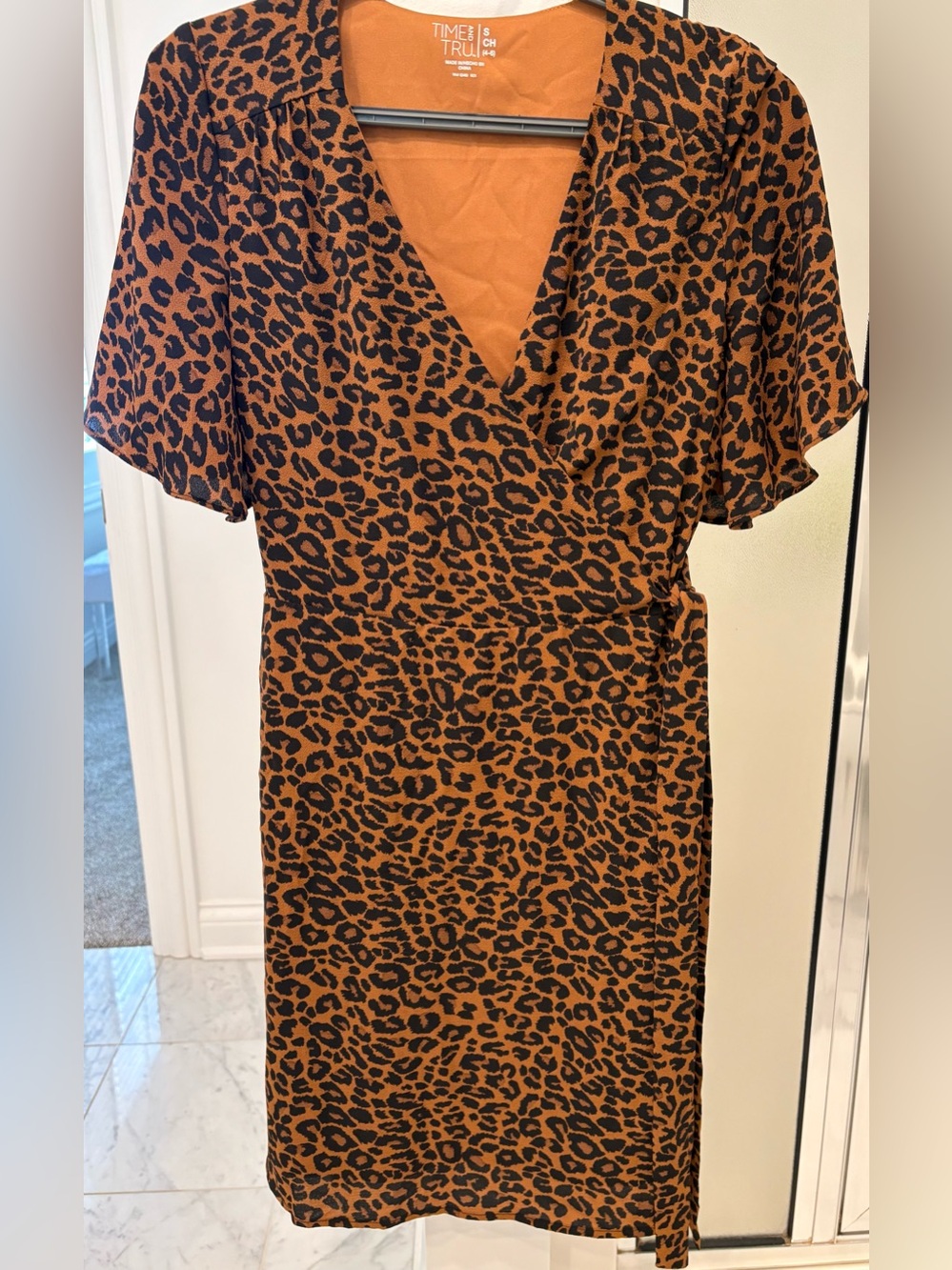 Time and Tru flutter sleeve leopard print dress with a wrap design Size S